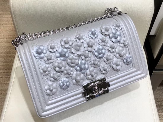 Chanel Boy Chanel Handbag in Silver Embroidered Metallic Grained Calfskin Silver Tone Metal