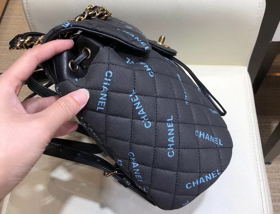Chanel Fabric Backpack in Black with All Over Blue Chanel Logo