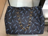 Chanel Large Shopping Bag in Black Fabric with Allover Printed Chanel Logo