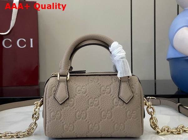 Gucci GG Emblem Super Mini Top Handle Bag in Taupe GG Embossed Grainy Leather 815256 Replica