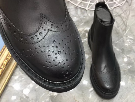 Prada Brushed Calf Leather Booties in Black with Perforated Motif on The Toe