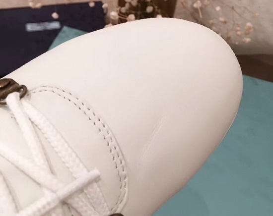 Prada Leather High Top Sneaker in White
