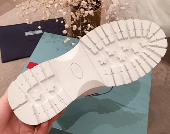 Prada Leather High Top Sneaker in White